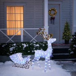 LuxenHome 2-Piece White Reindeer And Sleigh With Silver Bow And Ornaments Outdoor Holiday Decoration With Lights White, Multi, Silver, Brown 12 LuxenHome 2-Piece White Reindeer And Sleigh With Silver Bow And Ornaments Outdoor Holiday Decoration With Lights White, Multi, Silver, Brown -Northlight Shop GUEST 430197c2 2eee 41e9 8739 97b3b91b7ff2