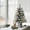 2ft Puleo Pre-Lit Flocked Tabletop Artificial Christmas Tree: Balsam, Hinged Branches, 35 Clear Lights, Metal Pot